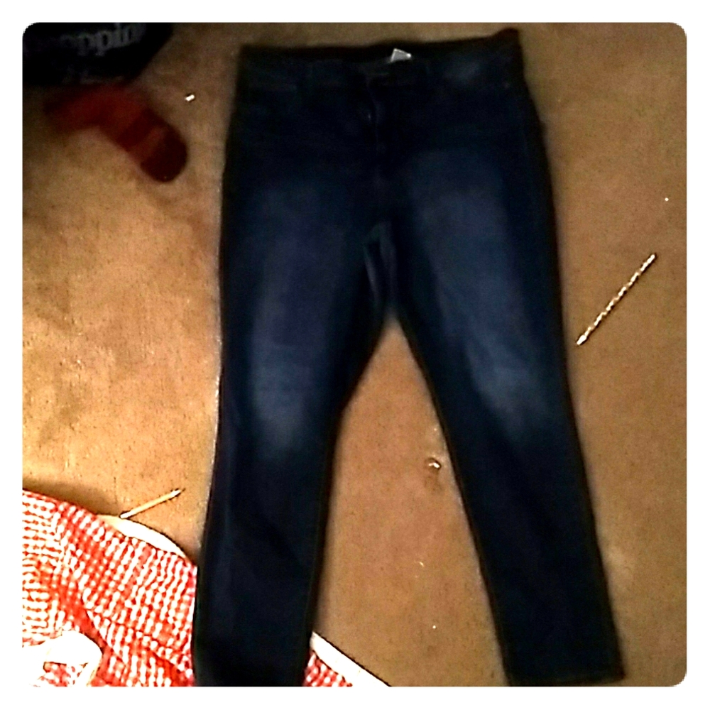 2 blue jeans, 1 red jeans, and one tight.